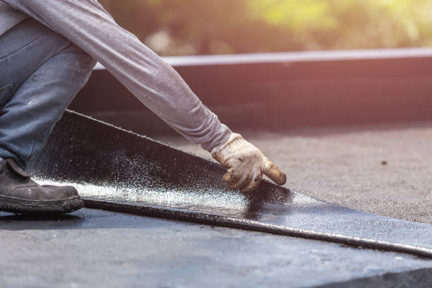 Professional Waterproofing technician working in Plover, WI